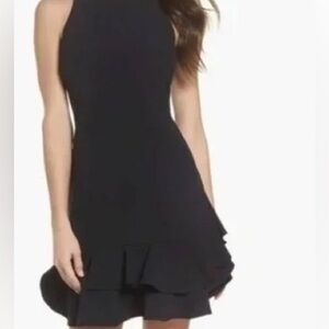 Chelsea 28 | Classic Black Sleeveless Ruffle-Hem Dress | Little black dress